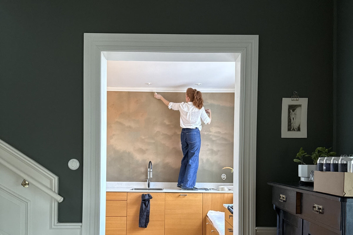 Before & After: How Interior Designer Malin Löfvenhamn Wersén Brought Warmth and Personality to Her Kitchen with a Wall Mural